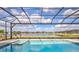 Beautiful pool and lake view from the backyard at 1201 Blue Shell Loop, Sarasota, FL 34240