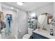 Clean bathroom with shower, vanity, and storage at 1402 N Gordon St, Plant City, FL 33563