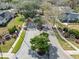 Gated community entrance with lush landscaping and paved roads at 19107 Centre Rose Blvd, Lutz, FL 33558