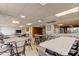 Spacious dining room with tables and seating, perfect for community gatherings and entertaining guests at 19701 Gulf Blvd # 328, Indian Shores, FL 33785