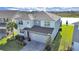 Stunning two-story house with lake view at 2302 Village Amble Loop, Lutz, FL 33558