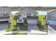 Two-story house with a gray roof and white siding at 2302 Village Amble Loop, Lutz, FL 33558