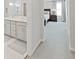 Main bedroom with ensuite bathroom and walk-in closet at 2302 Village Amble Loop, Lutz, FL 33558