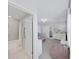 Bedroom with a view of the attached bathroom at 2302 Village Amble Loop, Lutz, FL 33558
