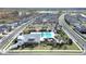 Aerial view of community with pool and playground at 2302 Village Amble Loop, Lutz, FL 33558