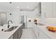 Sleek kitchen featuring stainless steel sink and appliances at 2302 Village Amble Loop, Lutz, FL 33558