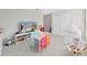 Playroom with TV, ' table and chairs, and a teepee at 2302 Village Amble Loop, Lutz, FL 33558