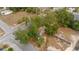 Aerial view of property featuring mature trees, street access at 3623 Whittier St, Tampa, FL 33619