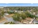 Aerial view of the neighborhood featuring mature trees and proximity to community amenities at 3623 Whittier St, Tampa, FL 33619