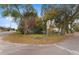 Expansive lot with mature trees, offering ample space and potential, located on a corner at 3623 Whittier St, Tampa, FL 33619