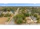 Aerial street view showcasing neighborhood homes, trees, and proximity to local landmarks at 3623 Whittier St, Tampa, FL 33619