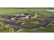 An aerial view showcasing the community clubhouse, pool, playground, and lush landscaping at 36424 Sespe Creek Ct, Zephyrhills, FL 33540