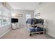 Bedroom with neutral walls, carpet, a triple monitor gaming setup and large windows providing natural light at 4509 Golden Gate Cv, Bradenton, FL 34211
