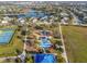 This community park features a splash pad, playground, and shaded seating areas at 4509 Golden Gate Cv, Bradenton, FL 34211