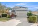 Charming two-story home with a well-manicured lawn and a spacious two-car garage at 4509 Golden Gate Cv, Bradenton, FL 34211