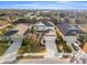 A lovely two-story home featuring a manicured lawn and an attached two-car garage provides great curb appeal at 4509 Golden Gate Cv, Bradenton, FL 34211
