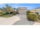 Charming two-story home with a well-manicured lawn and a spacious two-car garage at 4509 Golden Gate Cv, Bradenton, FL 34211