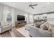 Spacious living room with modern decor, hardwood floors, and lots of natural light at 4509 Golden Gate Cv, Bradenton, FL 34211