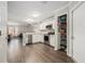 Open kitchen with stainless appliances, pantry, and breakfast bar at 5914 Falconwood Pl, Lithia, FL 33547