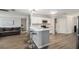 Beautiful open kitchen with bar seating and stylish backsplash at 5914 Falconwood Pl, Lithia, FL 33547