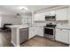 Updated kitchen featuring stainless steel appliances and modern countertops at 5914 Falconwood Pl, Lithia, FL 33547