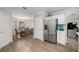 Bright kitchen with stainless steel appliances and adjacent dining area at 5914 Falconwood Pl, Lithia, FL 33547