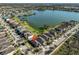 Aerial view featuring beautiful lake views and many single-Gathering homes at 6004 Sweet Birch Dr, Riverview, FL 33578