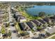 Aerial view of community featuring single-Gathering homes and a large lake at 6004 Sweet Birch Dr, Riverview, FL 33578