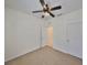 Well-lit bedroom features a ceiling fan, neutral carpet, and fresh paint at 6004 Sweet Birch Dr, Riverview, FL 33578