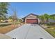 Charming single-Gathering home with an attached two-car garage, and well-kept landscaping at 6004 Sweet Birch Dr, Riverview, FL 33578