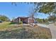 Inviting single-Gathering home with a well-maintained front lawn, tidy landscaping, and a 2 car garage at 6004 Sweet Birch Dr, Riverview, FL 33578