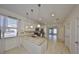 Bright kitchen with granite countertops, stainless steel appliances, and pendant lighting at 6004 Sweet Birch Dr, Riverview, FL 33578