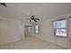 Neutral living room with tiled floors and lots of natural light from windows at 6004 Sweet Birch Dr, Riverview, FL 33578