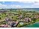 Beautiful aerial view of the waterfront complex, golf course, and the surrounding city at 6268 Palma Del Mar S Blvd # 101, St Petersburg, FL 33715