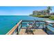 Community dock featuring a rocking chair and water views at 6268 Palma Del Mar S Blvd # 101, St Petersburg, FL 33715