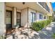 Charming front entrance to unit 102 with brick flooring and decorative accents at 6268 Palma Del Mar S Blvd # 101, St Petersburg, FL 33715
