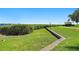 Beautifully landscaped green space with sidewalks leading to a gazebo at 6268 Palma Del Mar S Blvd # 101, St Petersburg, FL 33715
