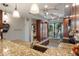 Bright kitchen featuring granite countertops, stainless steel appliances, and natural light from the large window at 6268 Palma Del Mar S Blvd # 101, St Petersburg, FL 33715