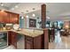 Open concept kitchen with granite counters, wine cooler, stainless steel appliances and bar seating at 6268 Palma Del Mar S Blvd # 101, St Petersburg, FL 33715