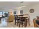 Bright, airy living space with tile floors, dining area, and access to a screened lanai at 6268 Palma Del Mar S Blvd # 101, St Petersburg, FL 33715