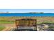 Waterfront view with a bench with views of the water and cityscape beyond at 6268 Palma Del Mar S Blvd # 101, St Petersburg, FL 33715