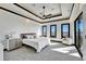 Serene bedroom with large windows offering abundant natural light and neighborhood views at 6536 Simone Shores Cir, Apollo Beach, FL 33572