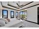 Light-filled bedroom featuring neighborhood views and a private terrace at 6536 Simone Shores Cir, Apollo Beach, FL 33572