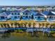 Beautiful waterfront homes boasting modern design, private pools, and well-maintained landscaping and private boat docks at 6536 Simone Shores Cir, Apollo Beach, FL 33572