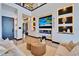 Contemporary living room with custom built-ins, fireplace, and stylish furnishings at 6536 Simone Shores Cir, Apollo Beach, FL 33572