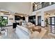 Open-concept living room and kitchen with high ceilings and modern finishes at 6536 Simone Shores Cir, Apollo Beach, FL 33572