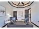 Well-lit home office with modern desk, comfortable chair, and ample storage space at 6536 Simone Shores Cir, Apollo Beach, FL 33572