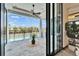 Inviting outdoor patio with ceiling fan, with pool and garden views, perfect for relaxation at 6536 Simone Shores Cir, Apollo Beach, FL 33572