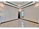 A stylish room featuring a modern chandelier and tile floors that provide an open feel at 6536 Simone Shores Cir, Apollo Beach, FL 33572