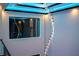 A staircase with a decorative chandelier at 6536 Simone Shores Cir, Apollo Beach, FL 33572